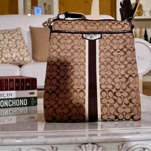 COACH Signature Stripe North/South Swingpack